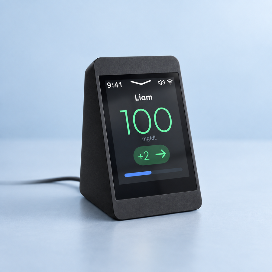 Black SugarHalo Mini displaying 100 mg/dL on a pale blue background